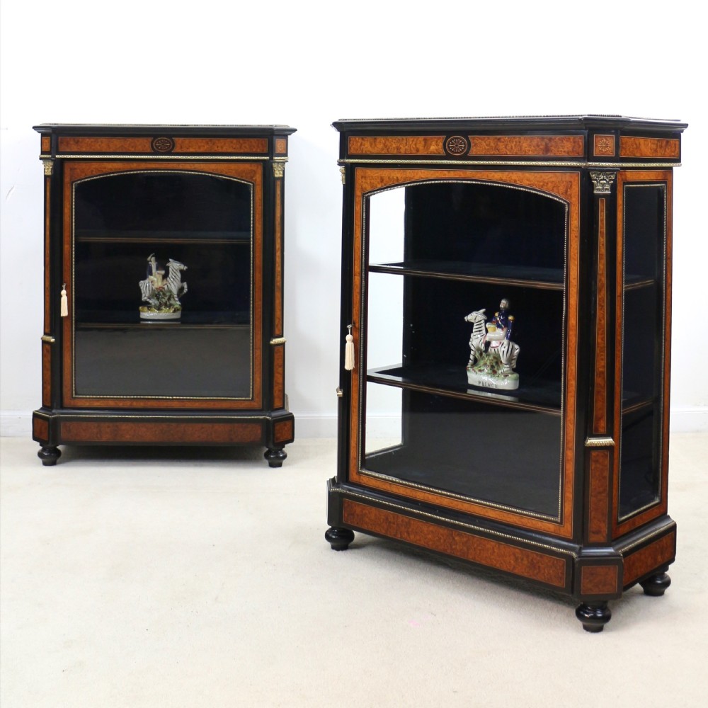 Pair of Victorian Gilt Metal Mounted, Ebonised and Amboyna Inlaid Pier Display Cabinets