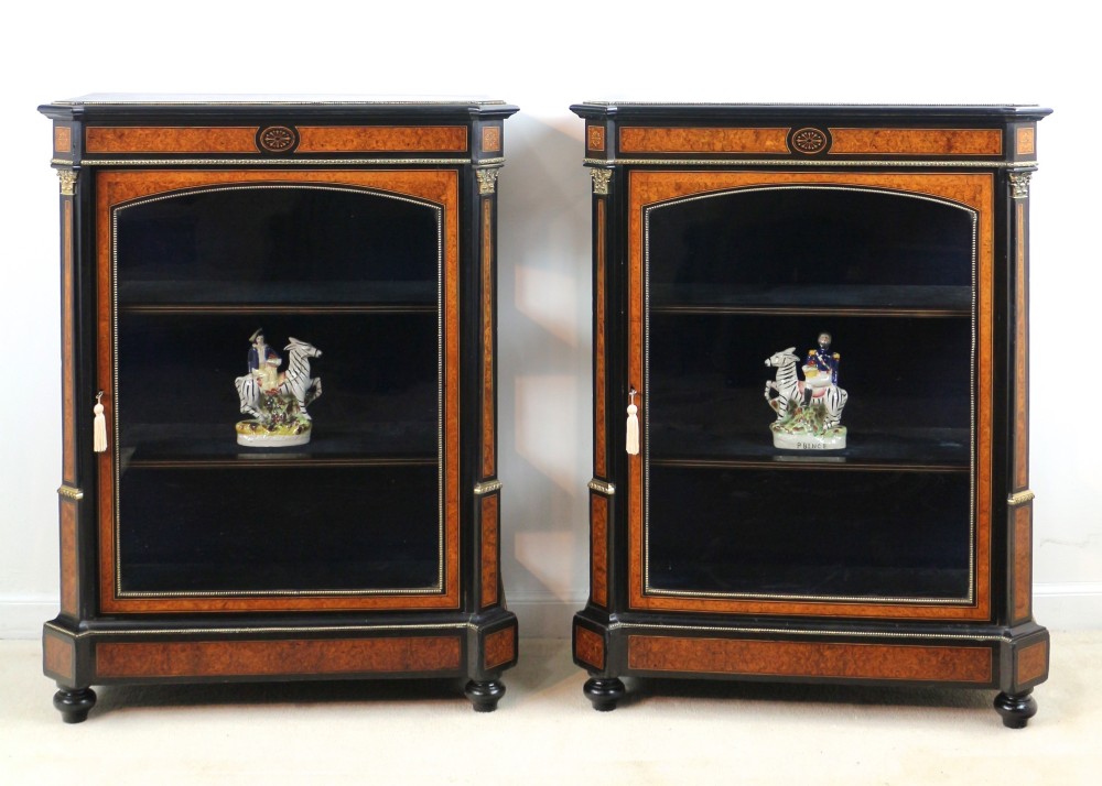 Pair of Victorian Gilt Metal Mounted, Ebonised and Amboyna Inlaid Pier Display Cabinets View II