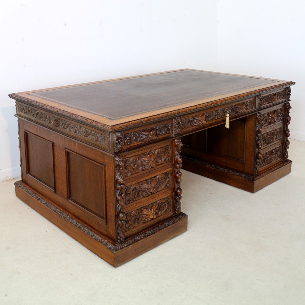 English Victorian Carved Oak Partners Desk attributed to Edwards & Roberts