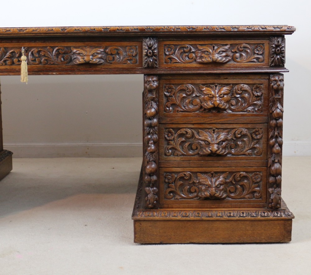 English Victorian Carved Oak Partners Desk attributed to Edwards & Roberts View II