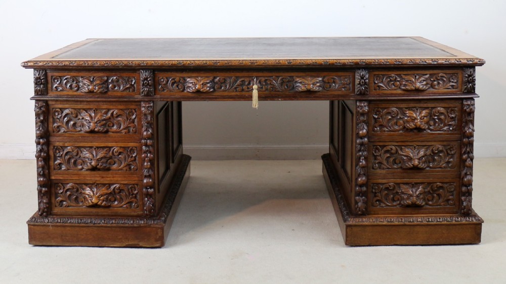 English Victorian Carved Oak Partners Desk attributed to Edwards & Roberts View III