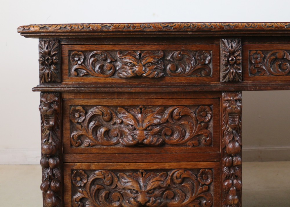English Victorian Carved Oak Partners Desk attributed to Edwards & Roberts View V