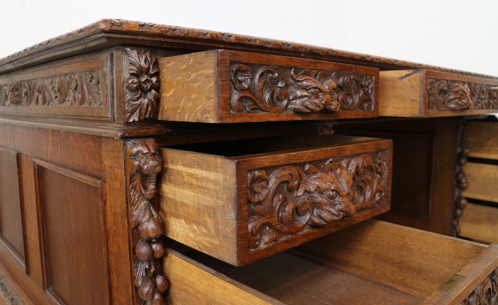English Victorian Carved Oak Partners Desk attributed to Edwards & Roberts View XXIII