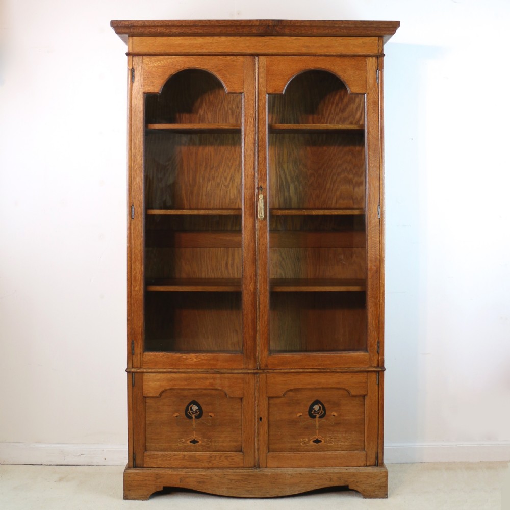 Arts & Crafts Oak Glazed Bookcase with Pewter & Ebonised Inlays