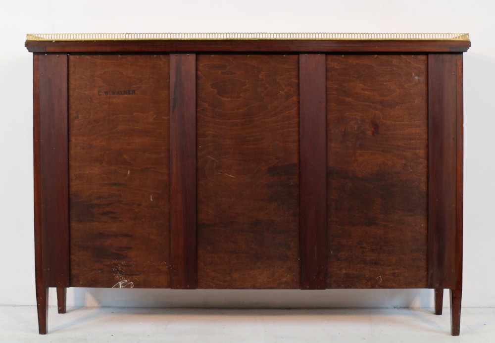 A Victorian walnut open bookcase featuring three horizontal shelves and a decorative brass gallery rail along the top edge. View XXIV
