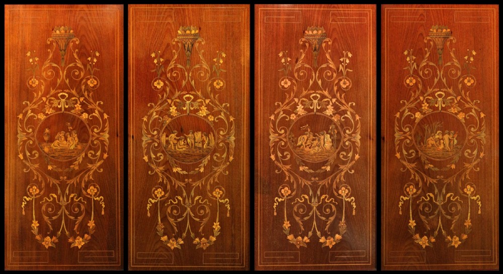 A large Victorian mahogany breakfront wardrobe with intricate floral marquetry inlays on the panel doors and lower drawer fronts. View XII