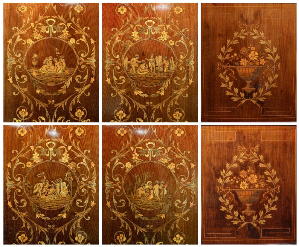 A large Victorian mahogany breakfront wardrobe with intricate floral marquetry inlays on the panel doors and lower drawer fronts. View XIII