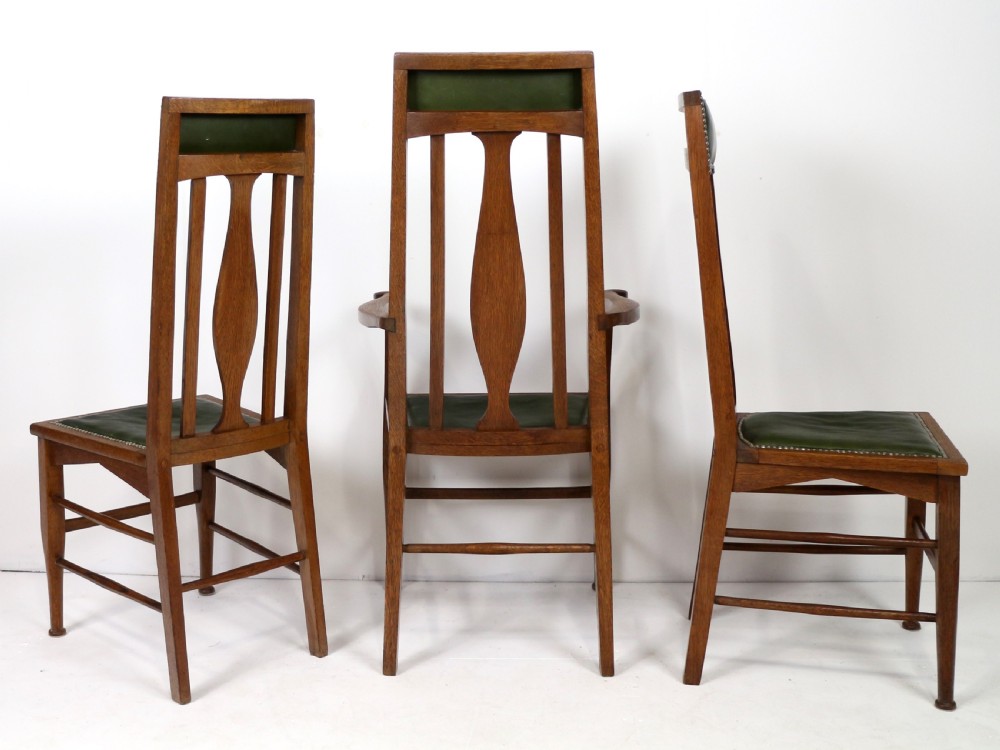 Set of 8 Arts & Crafts Oak Dining Chairs Attributed to E A Taylor, Wyllie & Lochhead View V