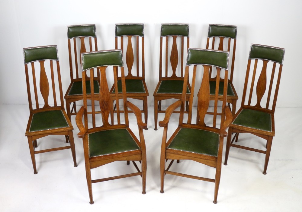 Set of 8 Arts & Crafts Oak Dining Chairs Attributed to E A Taylor, Wyllie & Lochhead View XXII