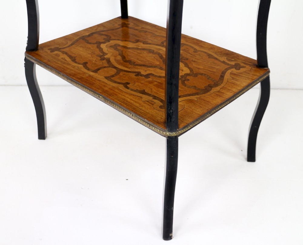 A late 19th-century French Napoleon III work table featuring floral marquetry inlays, ebonised legs, a single lockable drawer, and a lower shelf with brass mouldings. View XVI