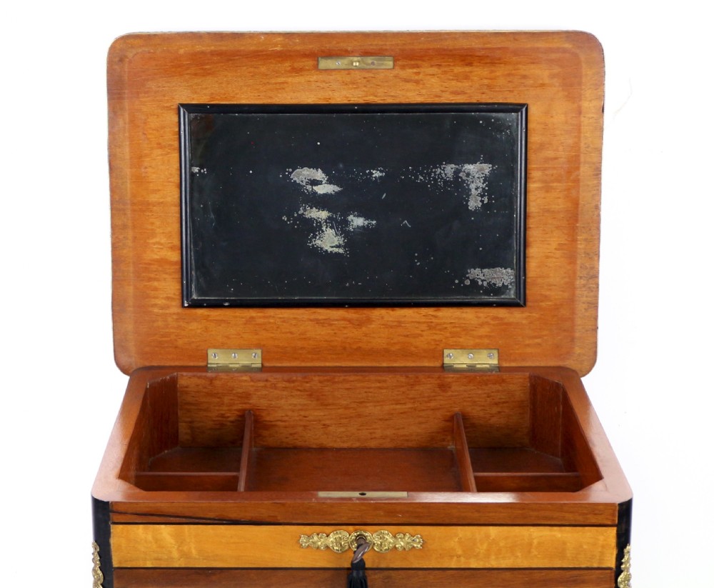A late 19th-century French Napoleon III work table featuring floral marquetry inlays, ebonised legs, a single lockable drawer, and a lower shelf with brass mouldings. View XX