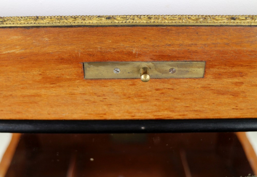 A late 19th-century French Napoleon III work table featuring floral marquetry inlays, ebonised legs, a single lockable drawer, and a lower shelf with brass mouldings. View XXIII