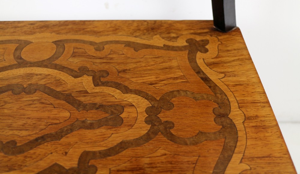 A late 19th-century French Napoleon III work table featuring floral marquetry inlays, ebonised legs, a single lockable drawer, and a lower shelf with brass mouldings. View XXIX