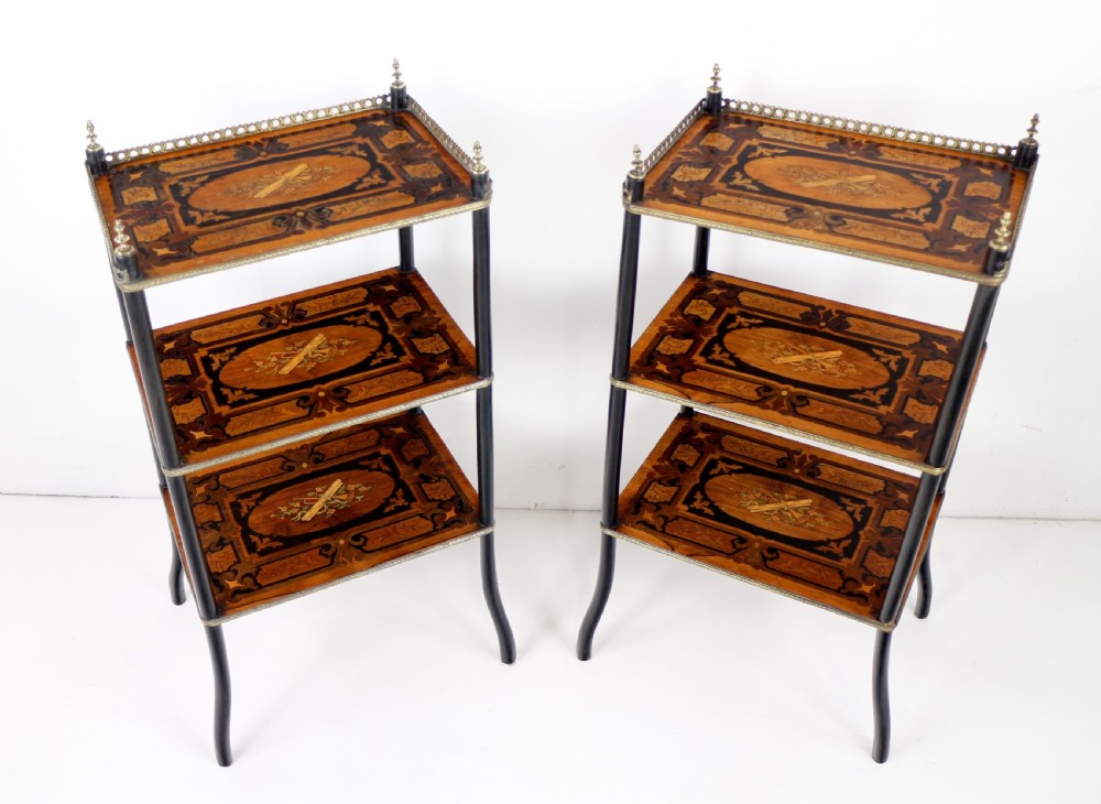 A pair of 19th-century French three-tier etageres featuring inlaid wood marquetry designs, ebonised legs, and pierced brass galleries on top. View III