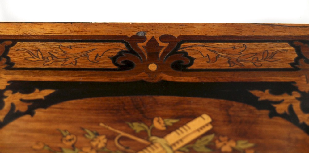 A pair of 19th-century French three-tier etageres featuring inlaid wood marquetry designs, ebonised legs, and pierced brass galleries on top. View XXIV