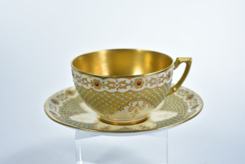 A Coalport Turquoise & Jewelled & Gilt Cabinet Cup & Saucer