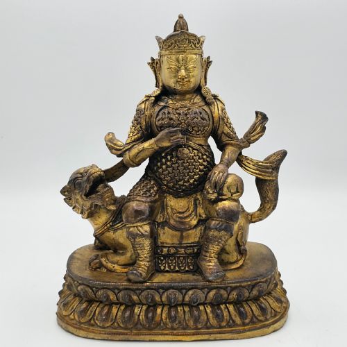 antique sino tibetan gilt bronze deity astride a kylin - CATEGORY: ANTIQUE METAL - DATED 1900