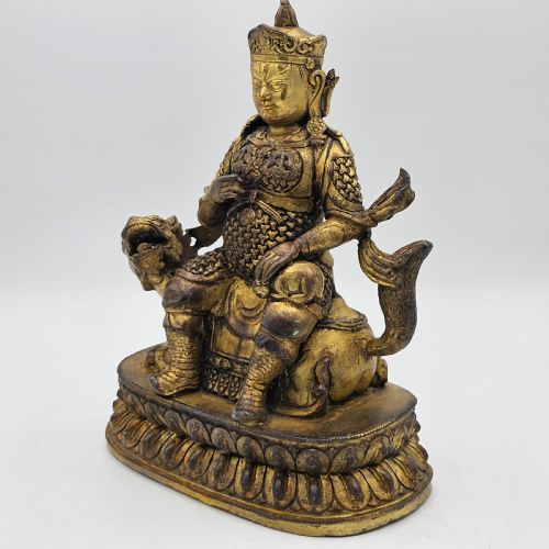 ANTIQUE SINO TIBETAN GILT BRONZE DEITY ASTRIDE A KYLIN - ADDITIONAL PHOTO 1