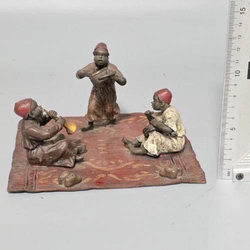 FRANZ BERGMAN AUSTRIAN 18611936 AN ORIENTALIST COLD PAINTED BRONZE GROUP DEPICTING THREE MUSICIANS ON A RUG STAMPED 'NAMGREB AND B' AND NUMBERED '7813' - ADDITIONAL PHOTO 2