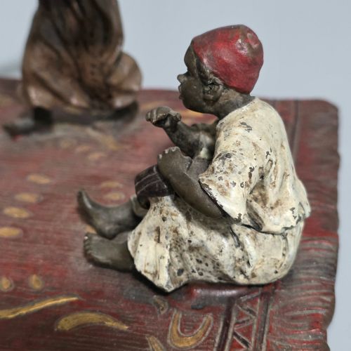 FRANZ BERGMAN AUSTRIAN 18611936 AN ORIENTALIST COLD PAINTED BRONZE GROUP DEPICTING THREE MUSICIANS ON A RUG STAMPED 'NAMGREB AND B' AND NUMBERED '7813' - ADDITIONAL PHOTO 3
