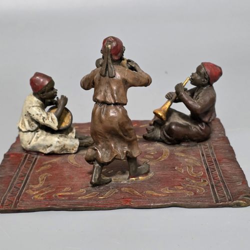 FRANZ BERGMAN AUSTRIAN 18611936 AN ORIENTALIST COLD PAINTED BRONZE GROUP DEPICTING THREE MUSICIANS ON A RUG STAMPED 'NAMGREB AND B' AND NUMBERED '7813' - ADDITIONAL PHOTO 9