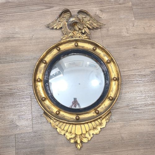 Delightful Antique Gilt Wood Convex Mirror Surmounted by a Large Spread Eagle 73cm X 45cm