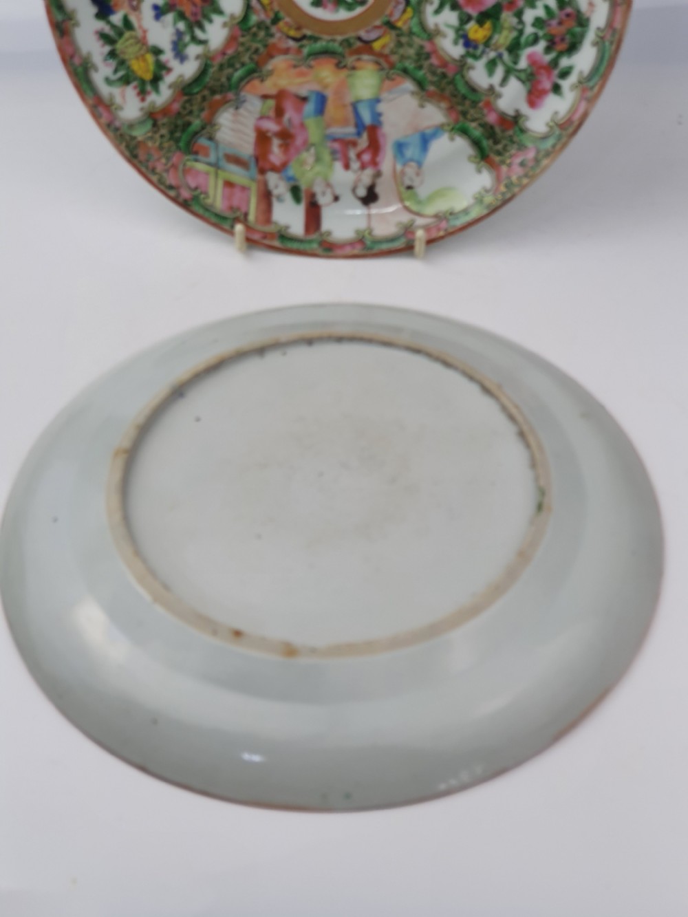 A pair of late 19th century Chinese Famille Rose plates View V