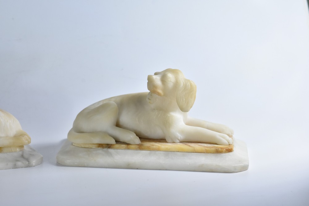 Fine pair of vintage carved alabaster recumbent dogs on a marble base c1900 View II