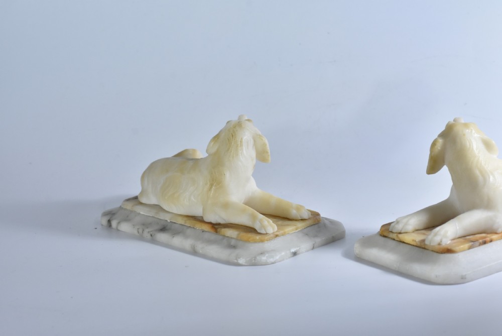 Fine pair of vintage carved alabaster recumbent dogs on a marble base c1900 View IV