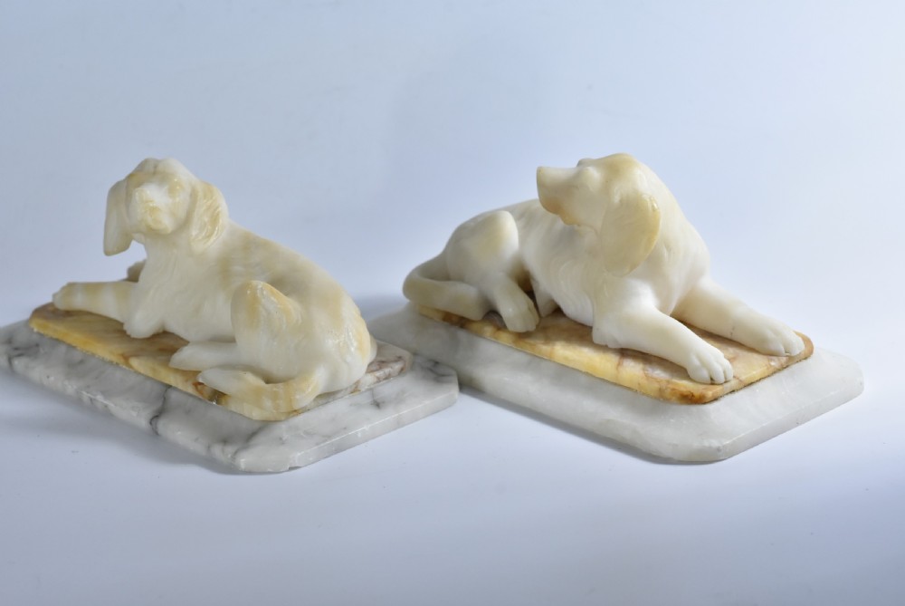 Fine pair of vintage carved alabaster recumbent dogs on a marble base c1900 View V