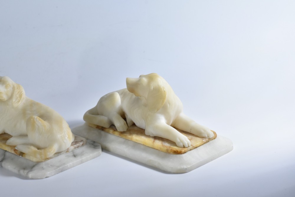 Fine pair of vintage carved alabaster recumbent dogs on a marble base c1900 View VI