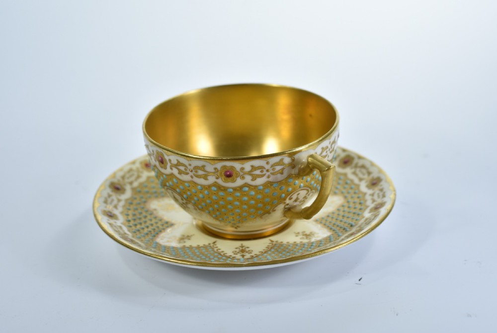 A Coalport Turquoise & Jewelled & Gilt Cabinet Cup & Saucer View III