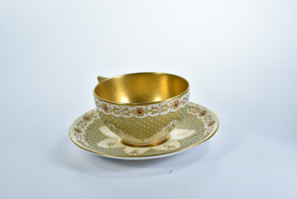 A Coalport Turquoise & Jewelled & Gilt Cabinet Cup & Saucer View VI