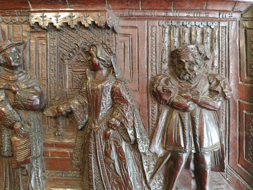 A Victorian Mahogany Carved Relief Panel Depicting Tudor Interior Scene View V