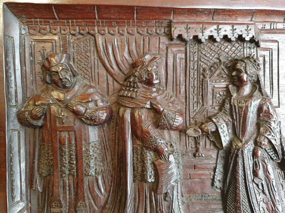 A Victorian Mahogany Carved Relief Panel Depicting Tudor Interior Scene View VI