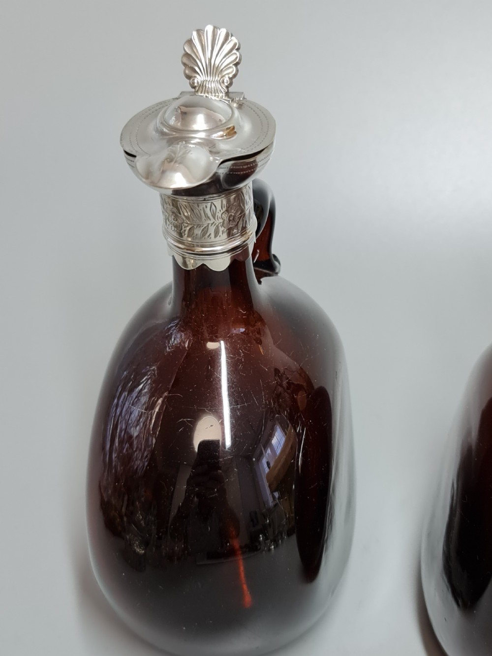 Superb Pair19th Century Matched Dark Amber Glass Decanters with Engraved Silver Plate Mounts View VIII
