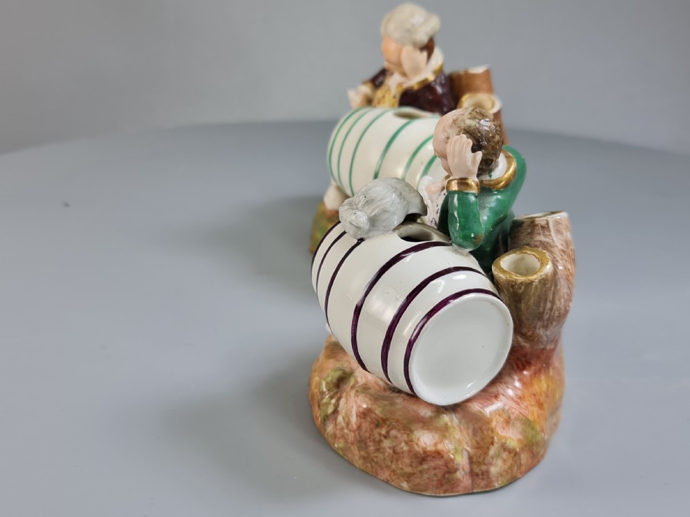 Unusual early 19thc Pair of Porcelain Inkwells formed as Barrels & Figures by Dudson View IV
