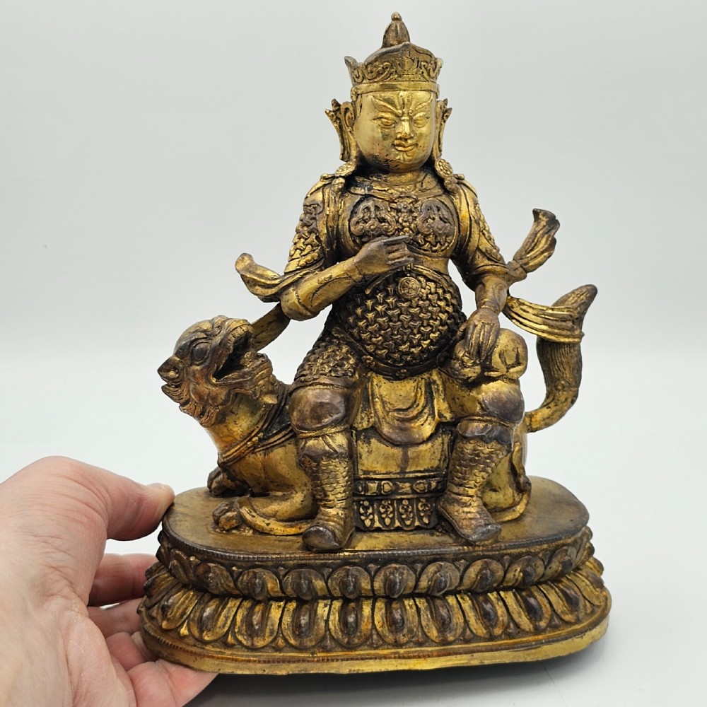 Antique Sino Tibetan Gilt Bronze Deity Astride a Kylin View V