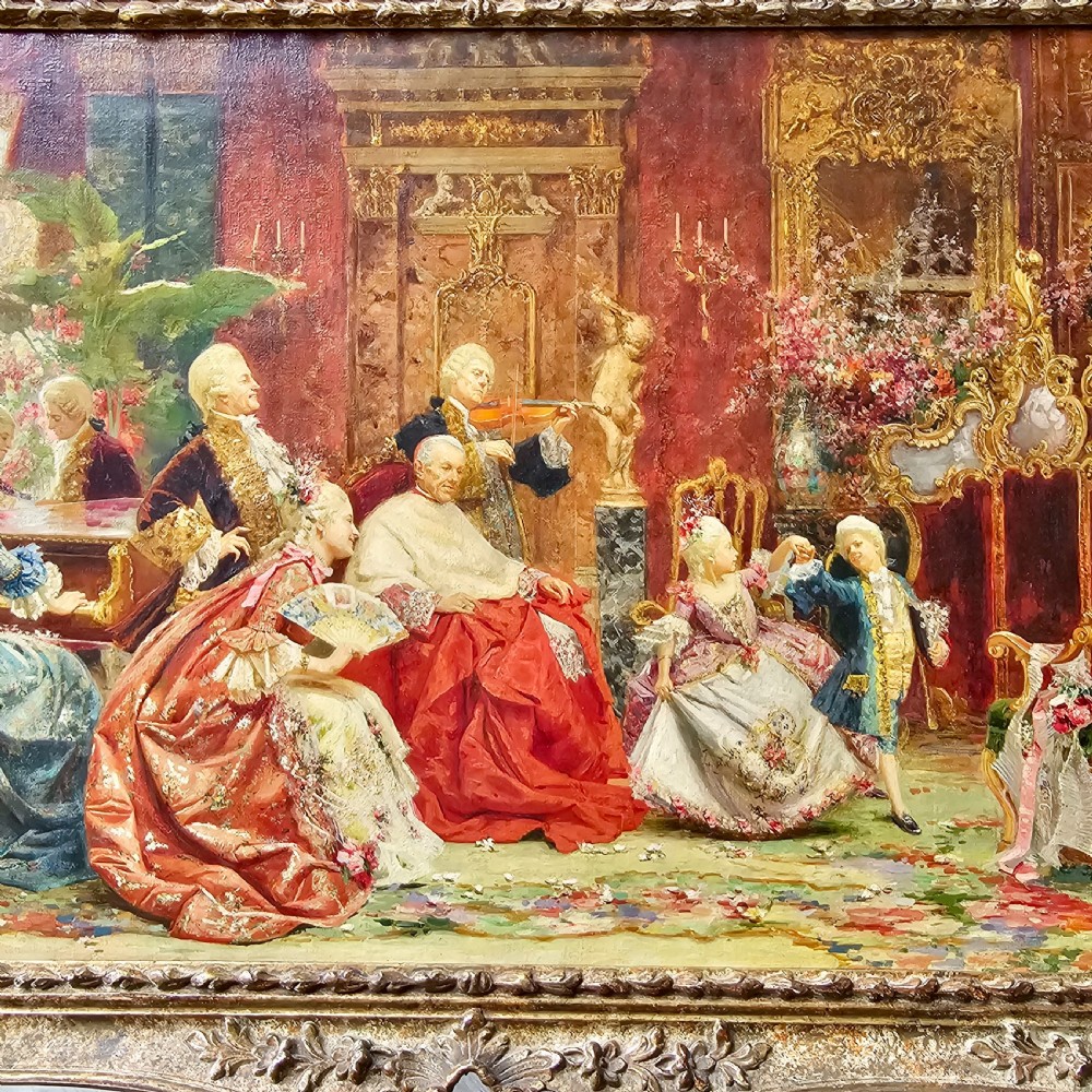 An antique oil on canvas painting by Joaquin Luque y Rosello depicting an elaborate 18th-century aristocratic salon gathering in a highly ornate gilt frame. View II