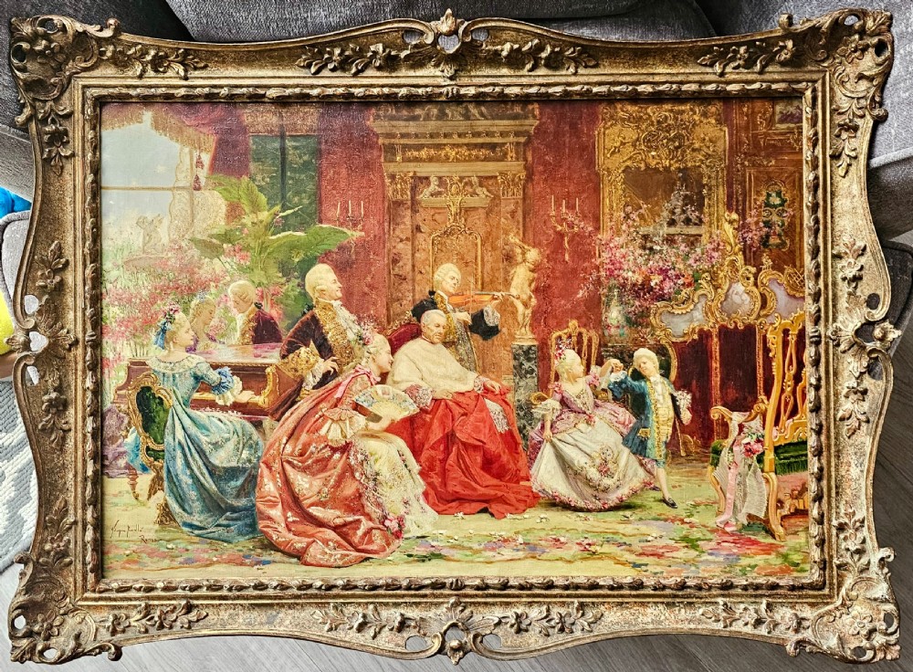 An antique oil on canvas painting by Joaquin Luque y Rosello depicting an elaborate 18th-century aristocratic salon gathering in a highly ornate gilt frame. View IX