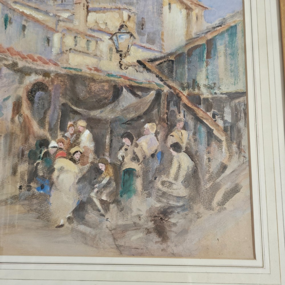 A framed Victorian watercolour painting depicting a European town market square with figures, architectural details, and a central tower in soft earth tones. View V