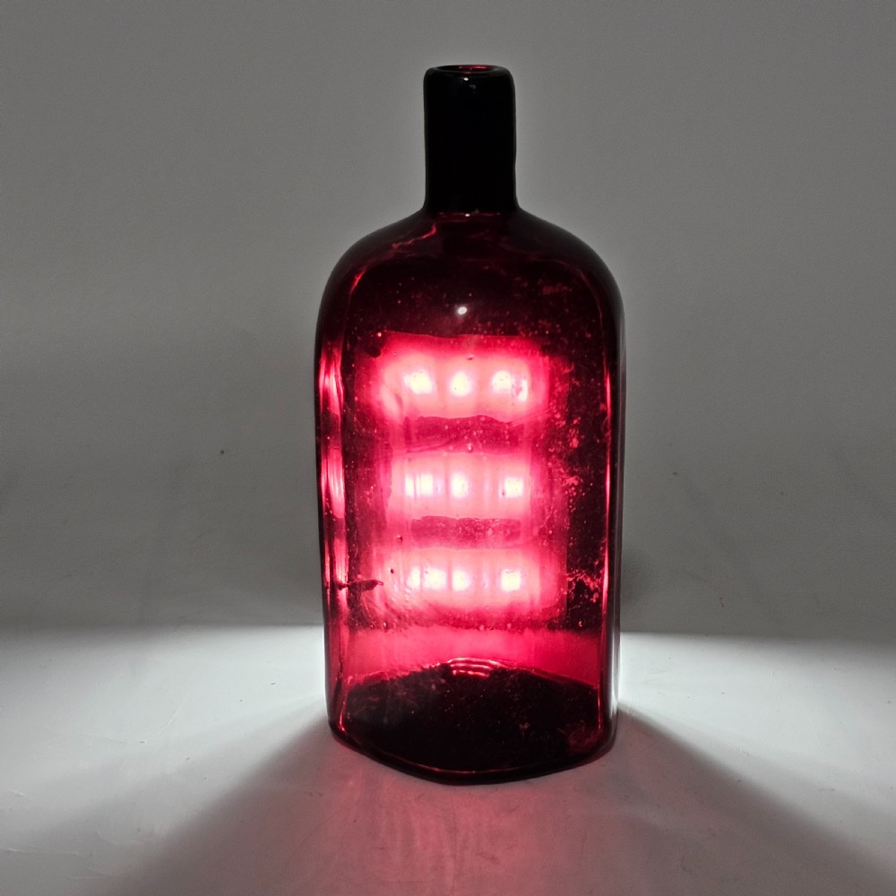 Fine Quality Early 19thc Purple Glass Bottle Gin? View V