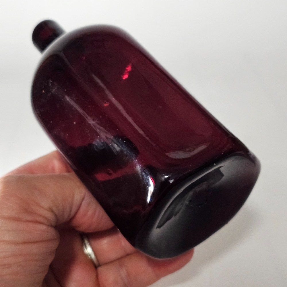 Fine Quality Early 19thc Purple Glass Bottle Gin? View XIV