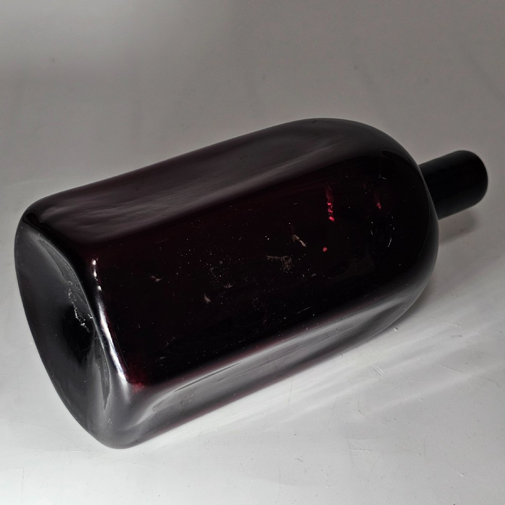 Fine Quality Early 19thc Purple Glass Bottle Gin? View XV