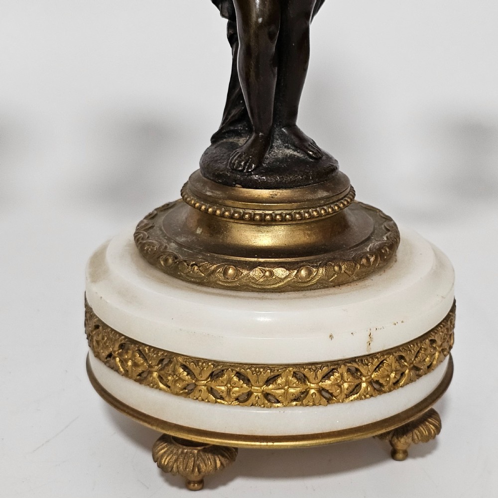 A pair of French Louis XVI-style marble and ormolu two-light candelabra, 20th Century. View IV