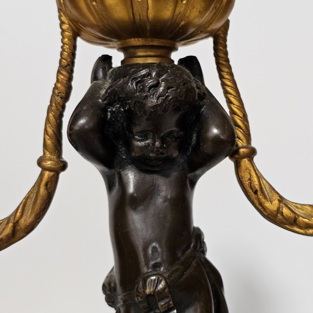 A pair of French Louis XVI-style marble and ormolu two-light candelabra, 20th Century. View IX