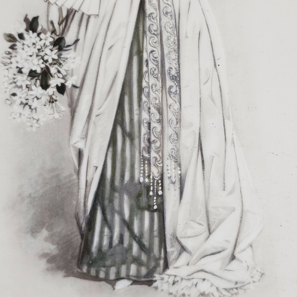 A rectangular framed porcelain plaque featuring a monochrome depiction of an Edwardian lady holding a fan within an ornate gilt frame. View III