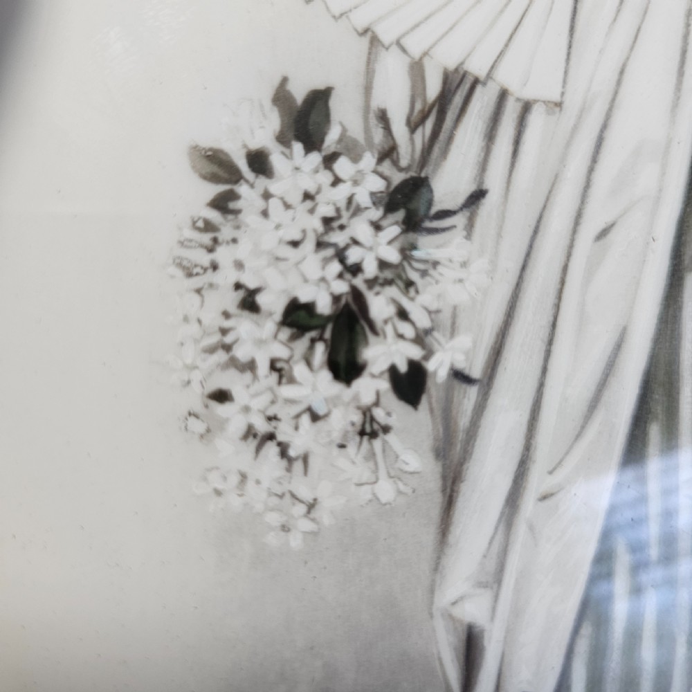 A rectangular framed porcelain plaque featuring a monochrome depiction of an Edwardian lady holding a fan within an ornate gilt frame. View VIII