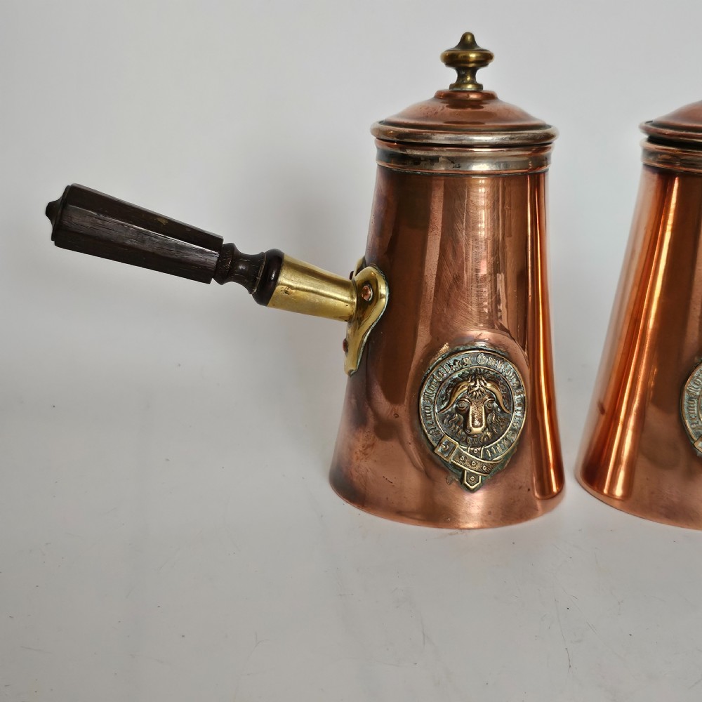 Antique Pair of Copper Chocolate Pots with Applied Brass Motifs