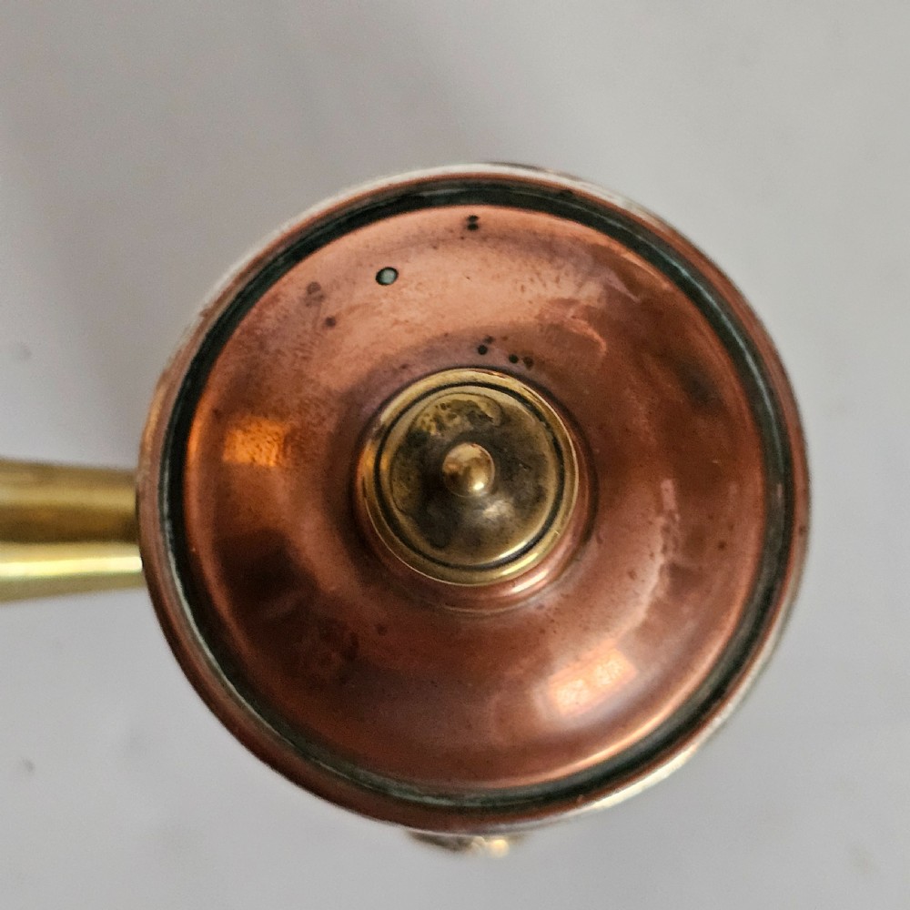 Antique Pair of Copper Chocolate Pots with Applied Brass Motifs